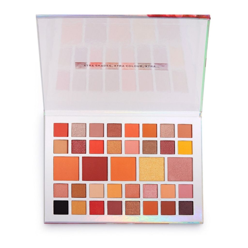 Makeup palette with various color swatches on a white background