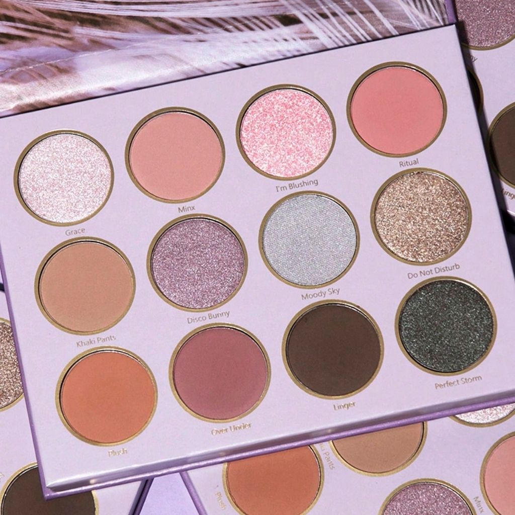 SHEGLAM mauve-glows palette packaging with feather design on a white background