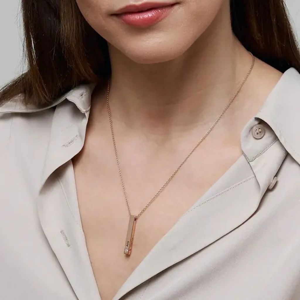 Necklace worn by a person with a neutral background