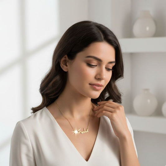 Woman wearing a gold necklace in a bright room