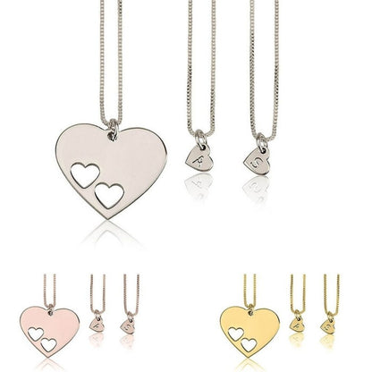 Collection of heart-shaped necklaces in various colors on a white background