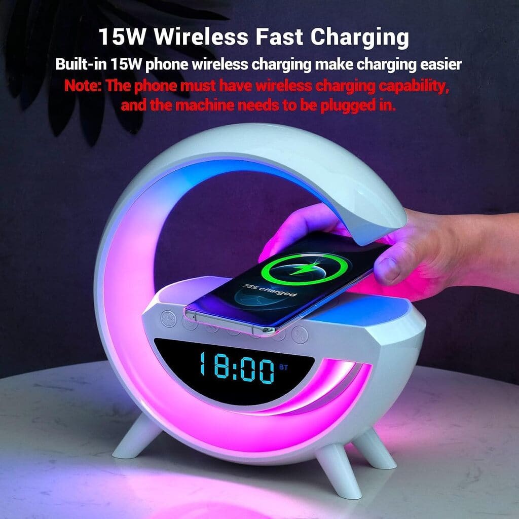 Wireless charging device with digital clock and phone on a dark background
