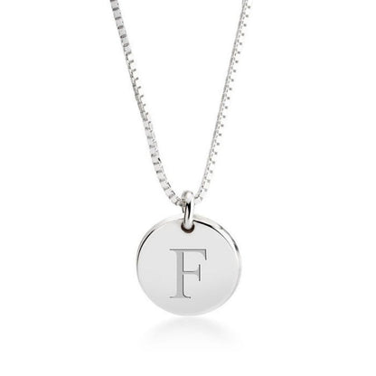Silver necklace with a round pendant featuring the letter 'F' on a white background