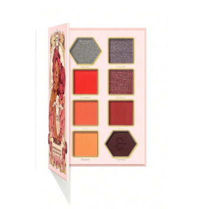 Makeup palette with various shades on a white background