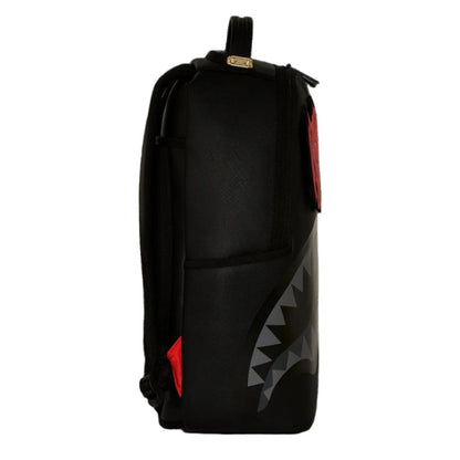 Black backpack with shark mouth design on a white background