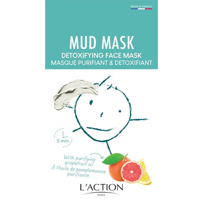 Detoxifying face mask packaging with a cartoon face and grapefruit illustration, featuring L'Action Paris brand.