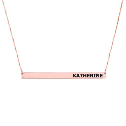Rose gold necklace with a bar pendant inscribed with 'KATHERINE' on a white background