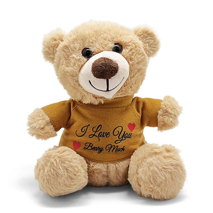 Plush teddy bear wearing a shirt with 'I Love You Beary Much' text on a white background