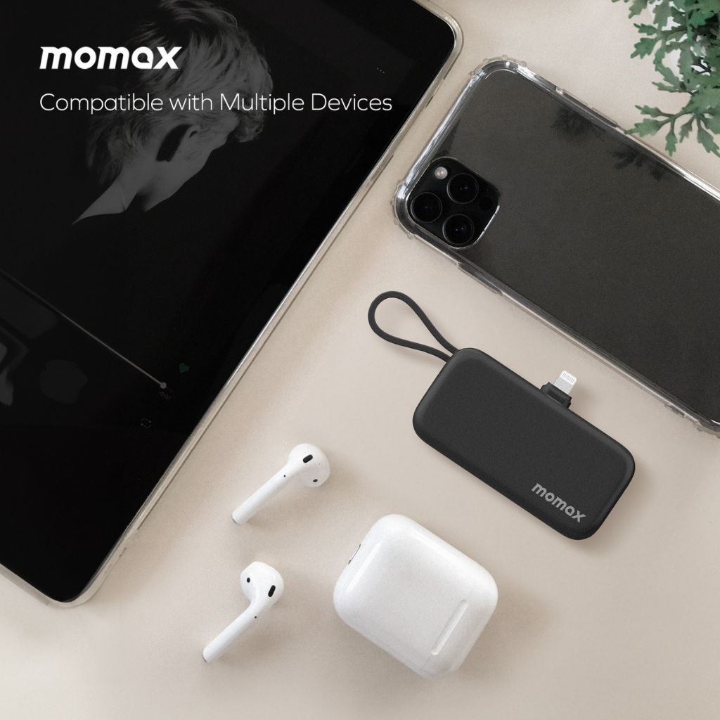 momax portable charger and wireless earbuds on a light surface with 'momax' branding.