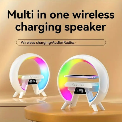 Multi-in-one wireless charging speaker with colorful LED lights on a wooden surface.