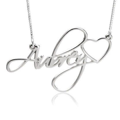 Silver necklace with 'Aimee' and heart design on a white background