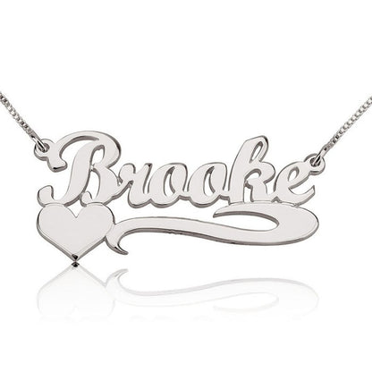 Silver 'Brooke' necklace with a heart on a white background