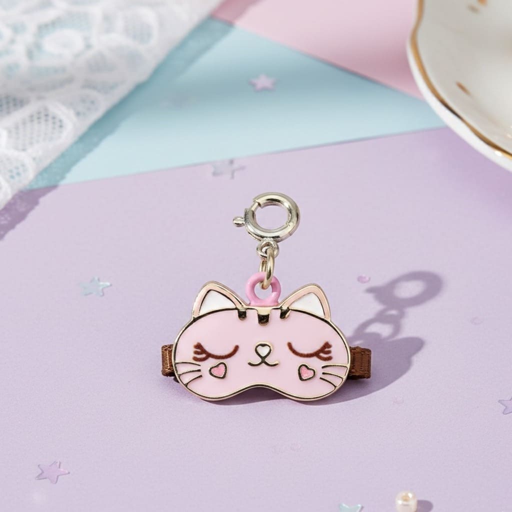 Cat-shaped hair clip on a colorful background