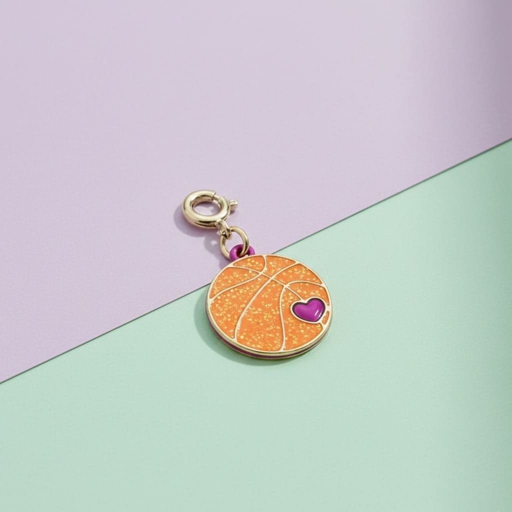 Basketball charm with a heart on a two-tone background
