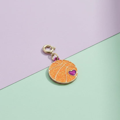 Basketball charm with a heart on a two-tone background