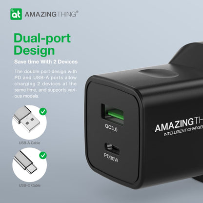 Black charging adapter with dual ports and 'Amazing Thing' branding on a light gray background