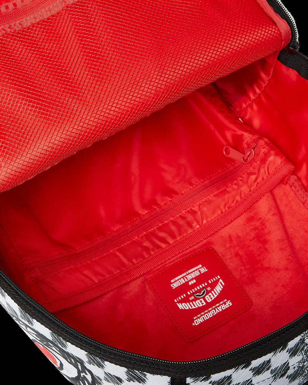 Red bag interior with a visible brand logo