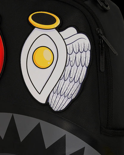 Patch with an egg, wings, and halo on a black background