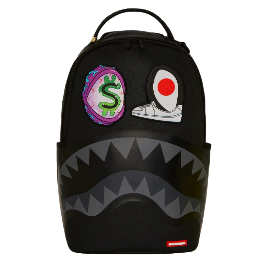 Black backpack with colorful patches on a black background