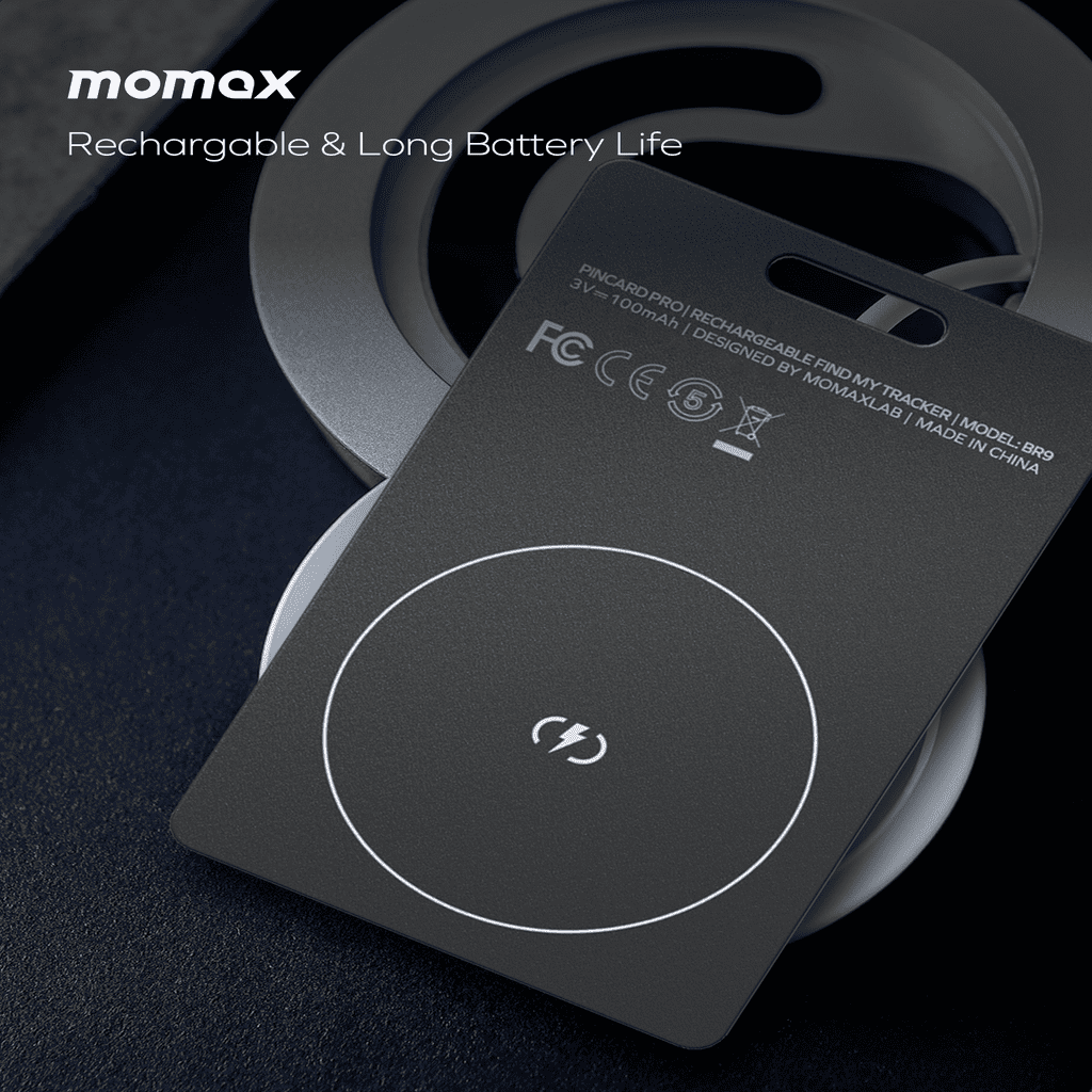 Wireless charging pad with妈扣(Momax) branding on a dark background