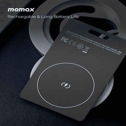 Wireless charging pad with妈扣(Momax) branding on a dark background