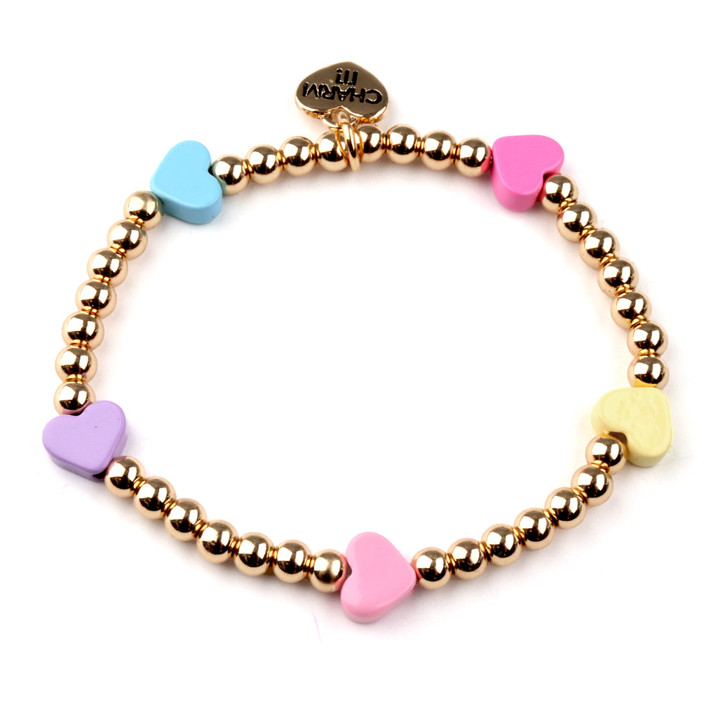 Bracelet with gold beads and colorful heart-shaped charms on a white background