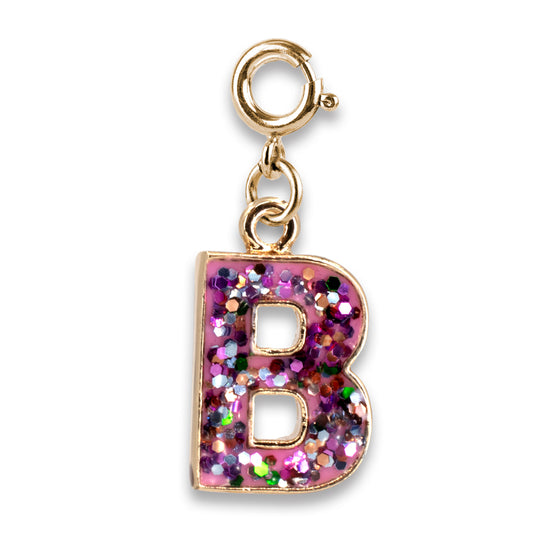 Gold charm with a pink glittery letter 'B' on a white background