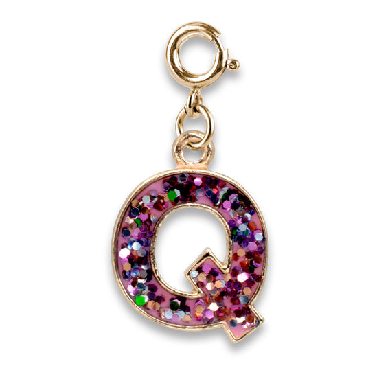 Gold charm with a multicolored glittery letter 'Q' on a white background