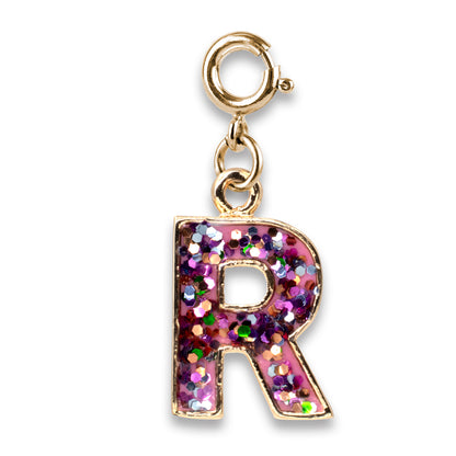 Gold charm with a glittery letter 'R' on a white background