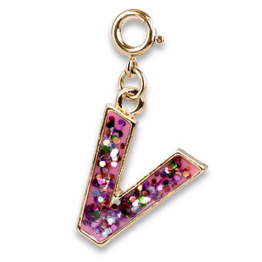 Gold charm with a pink letter 'V' filled with glitter on a white background