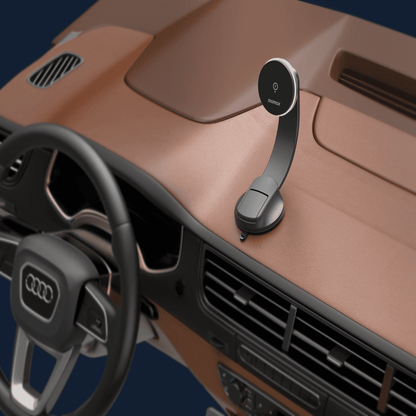 Car dashboard with a smartphone mount and Audi steering wheel