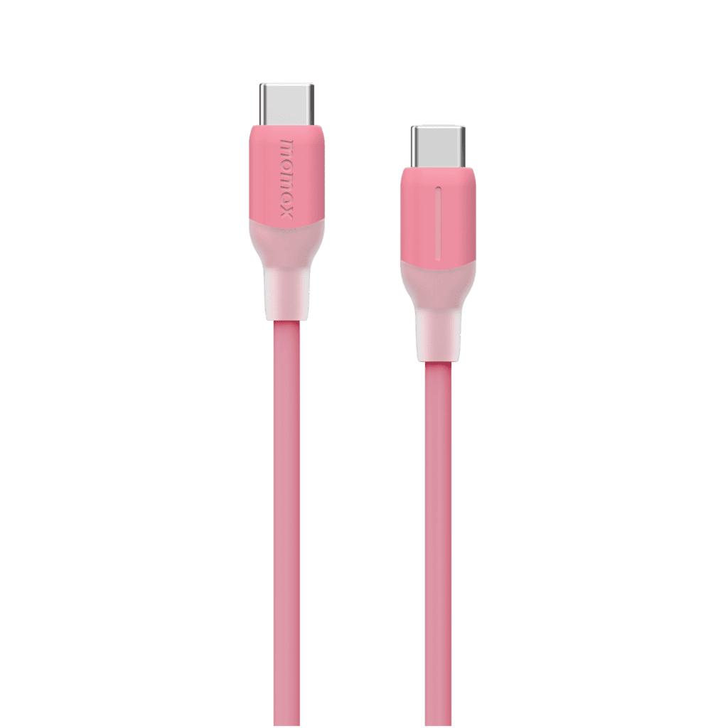 Pink charging cable with connectors on a green background