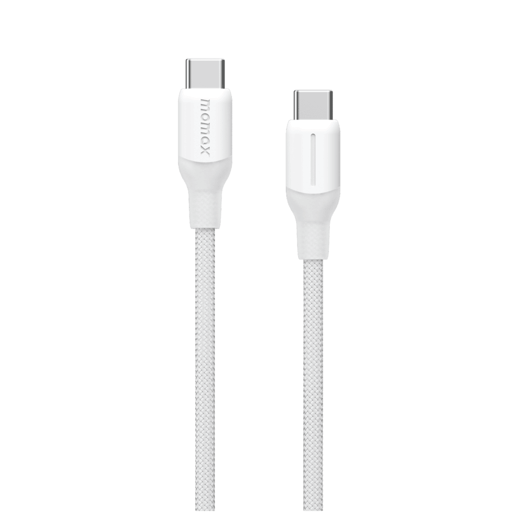 Two white charging cables with connectors on a green background