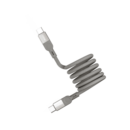 Coiled USB cable with connectors on a transparent background