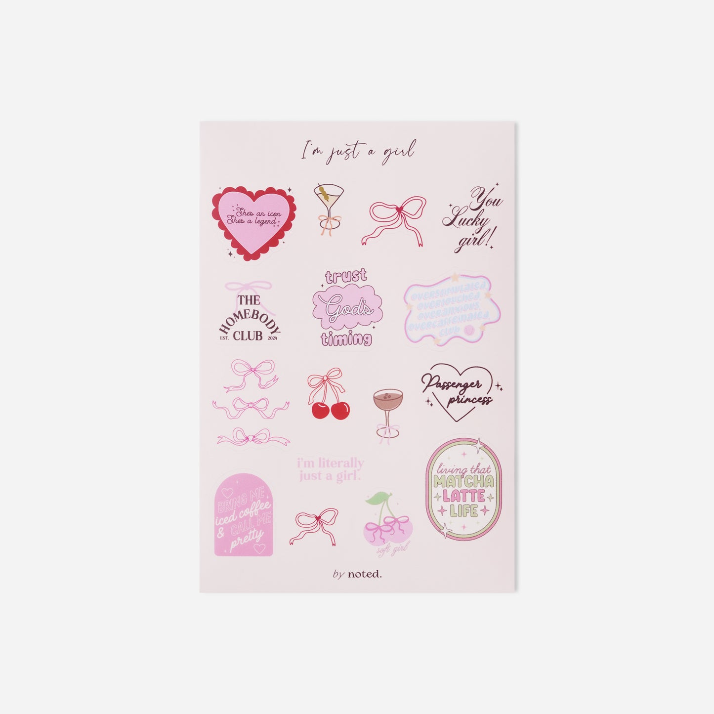Sheet of pink temporary tattoos with various designs on a white background