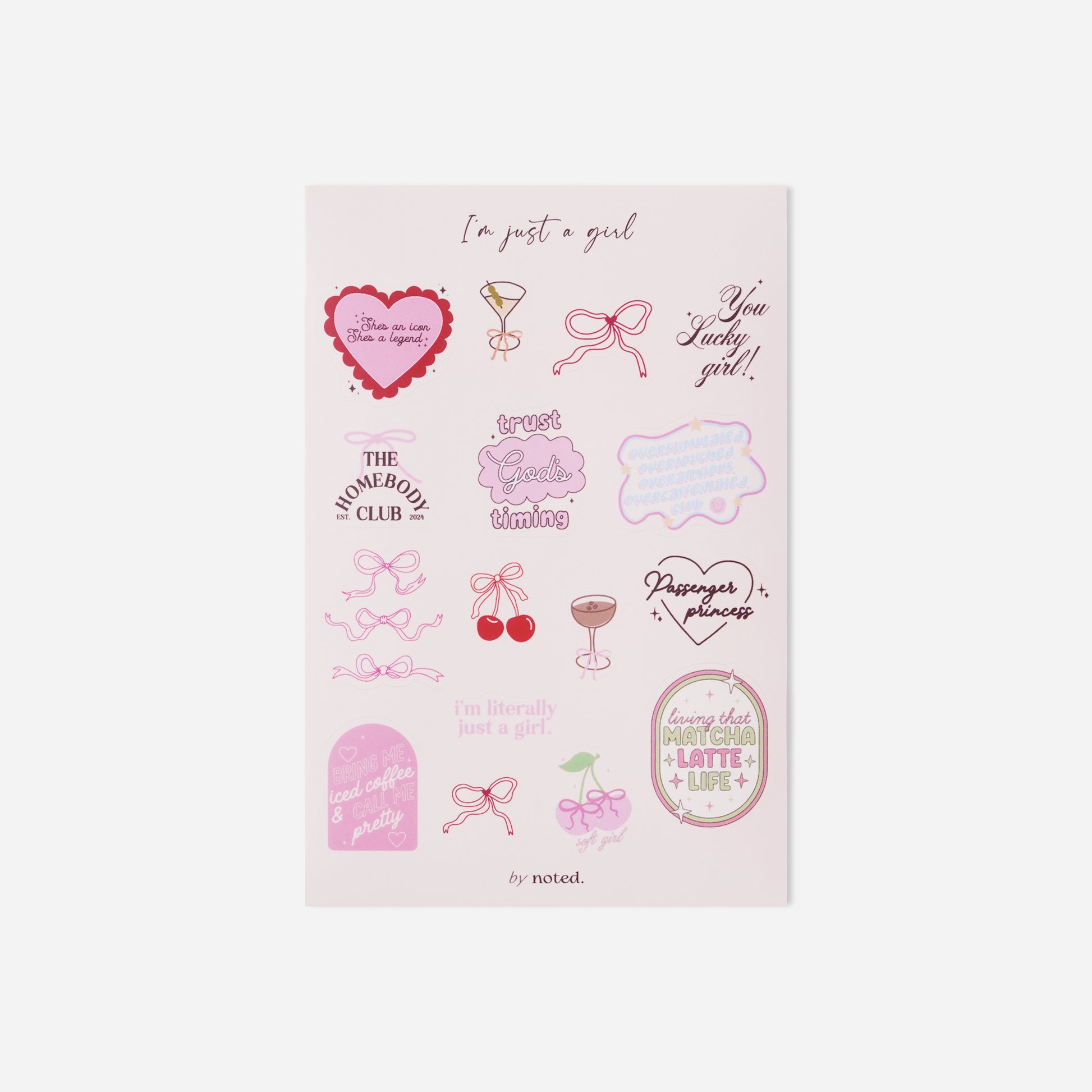 Sheet of pink temporary tattoos with various designs on a white background
