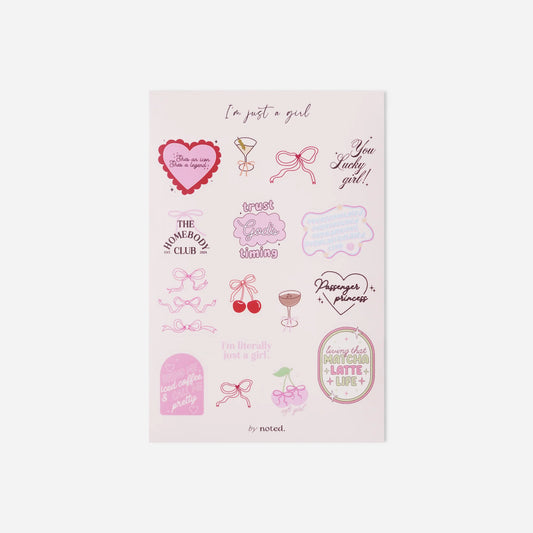 Sheet of temporary tattoos with various designs on a white background