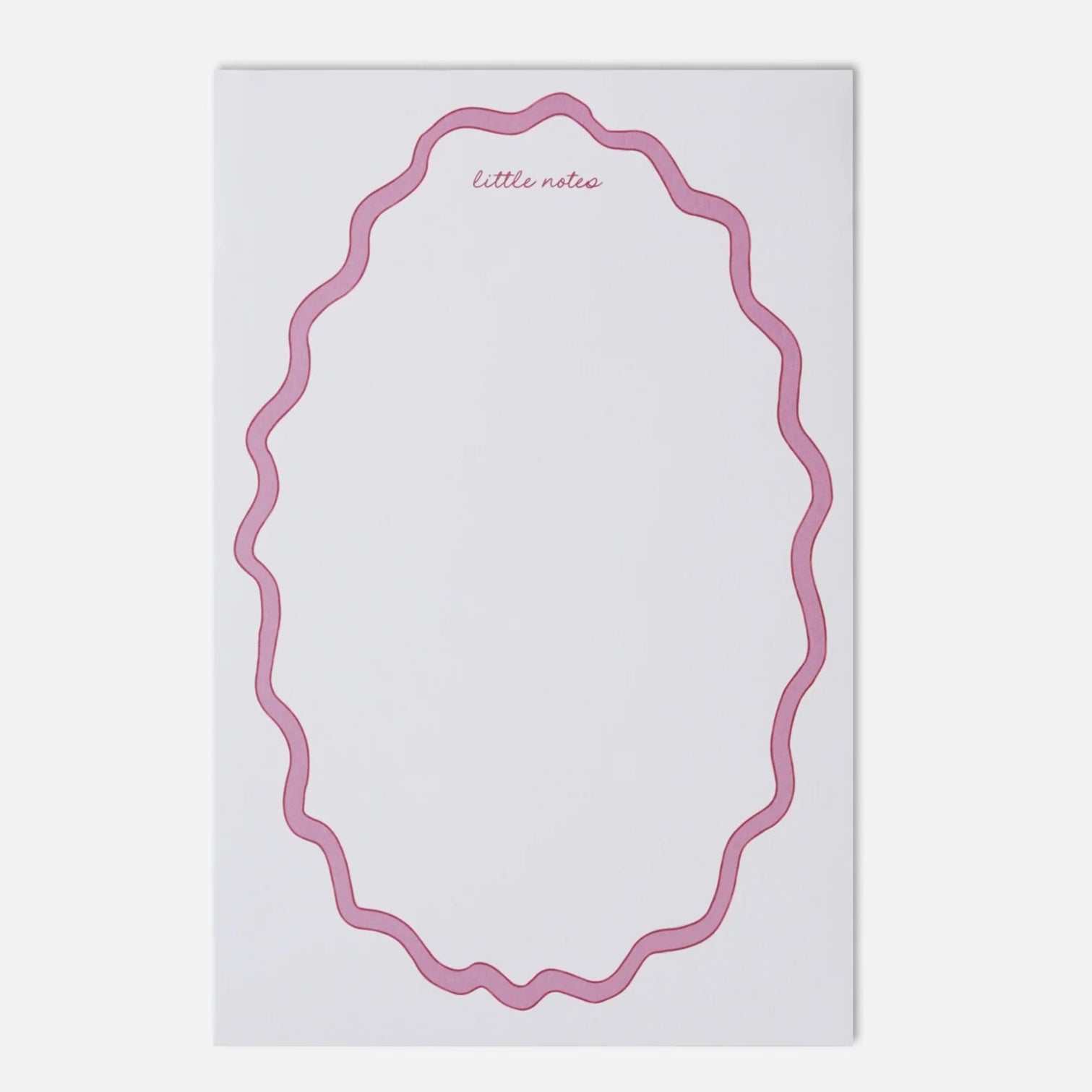 Notepad with pink decorative border on a white background