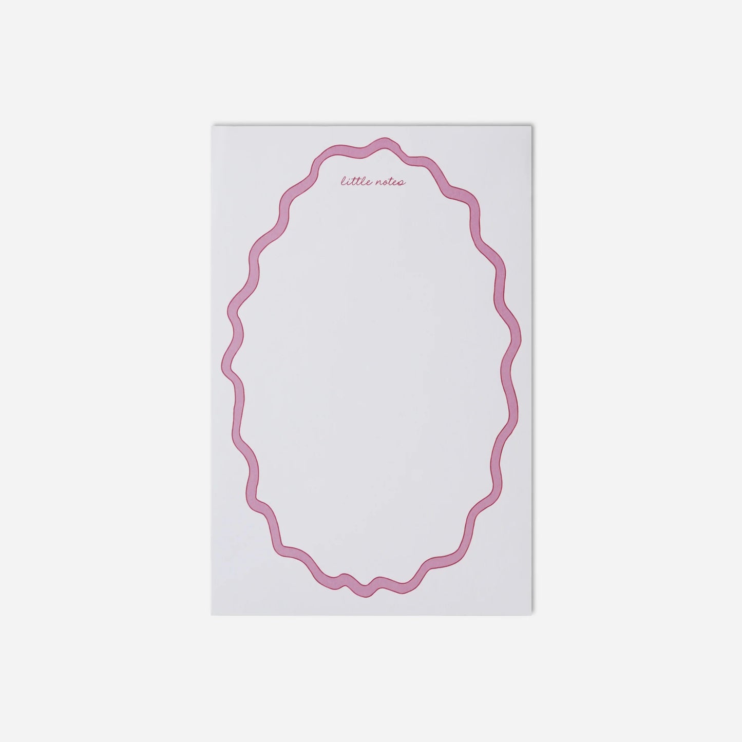 Notepad with pink decorative border on a white background