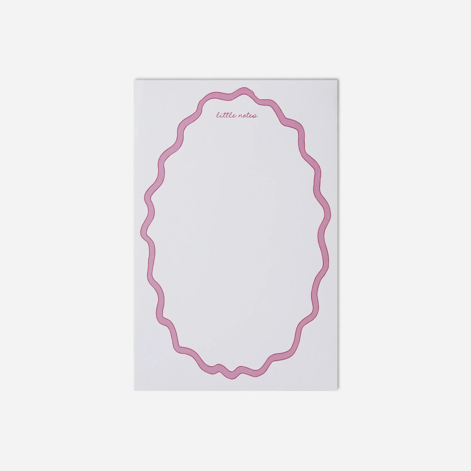 Notepad with pink decorative border on a white background