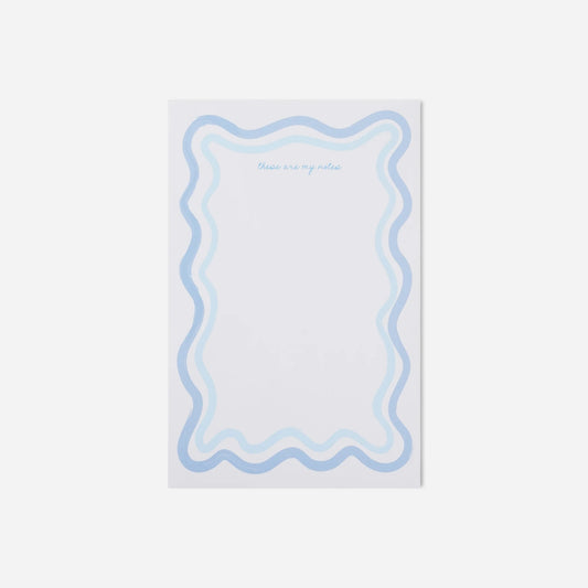 Notepad with wavy blue border and text on a white background
