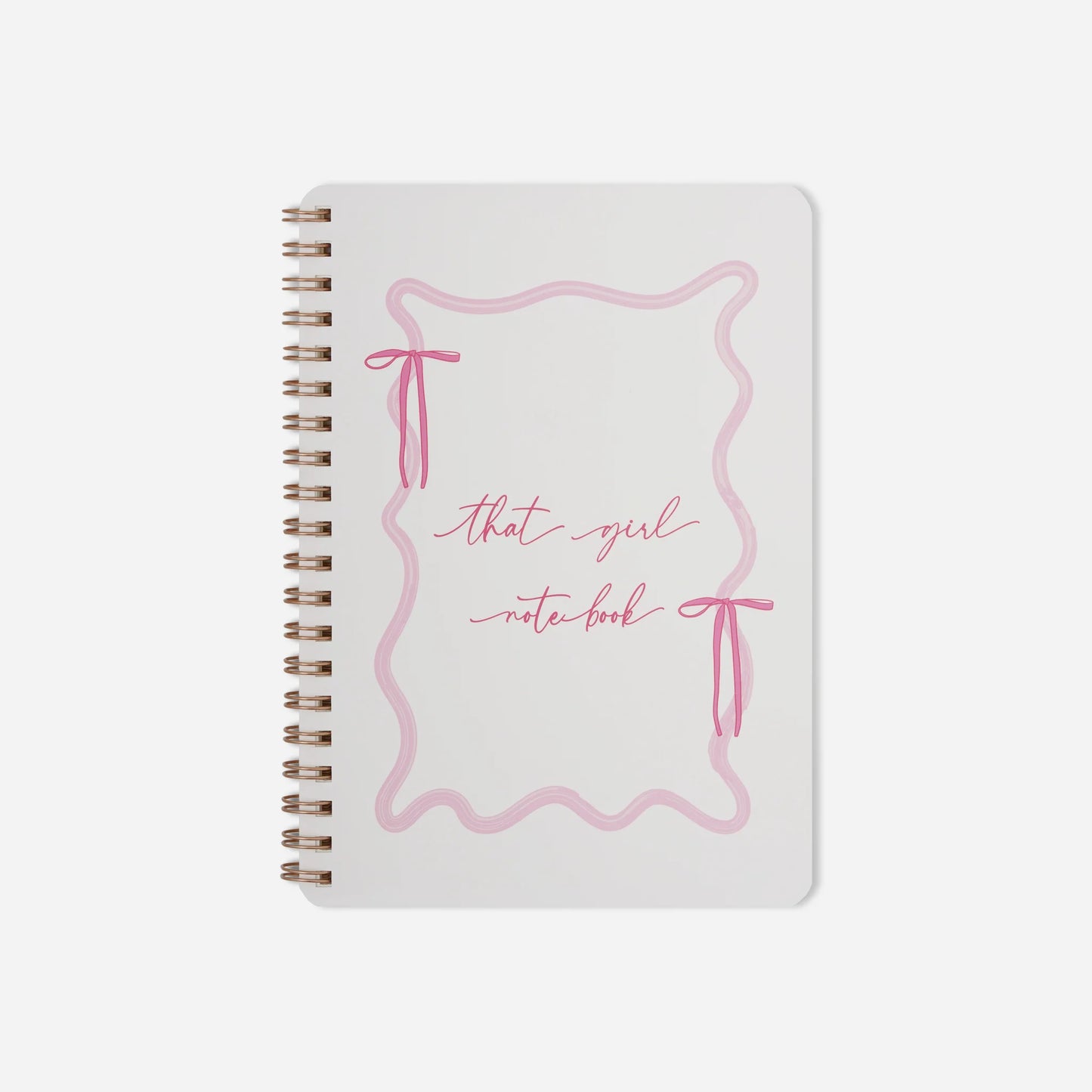 Notebook with pink design and text on a white background