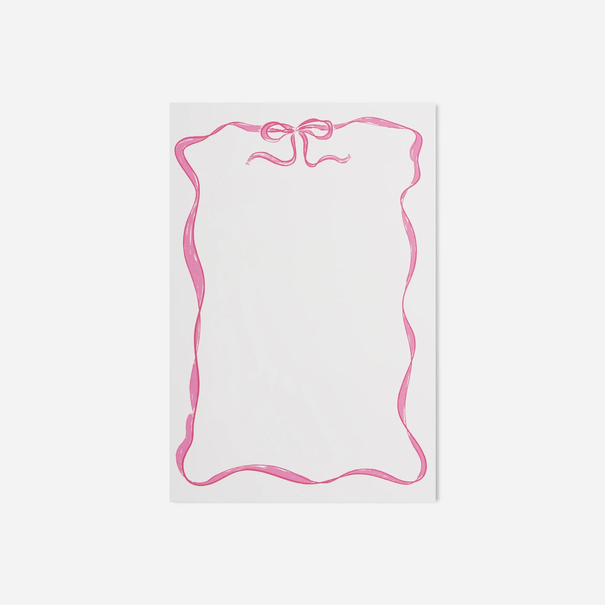 White notepad with pink decorative border on a white background