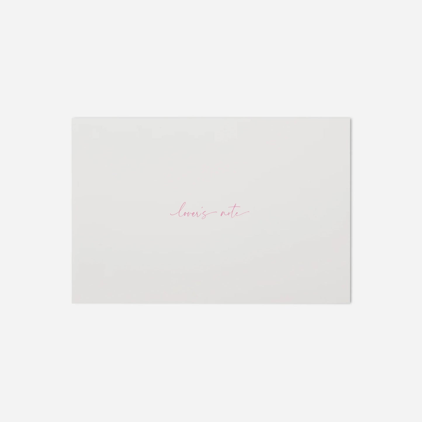 White paper with 'loves note' text on a white background