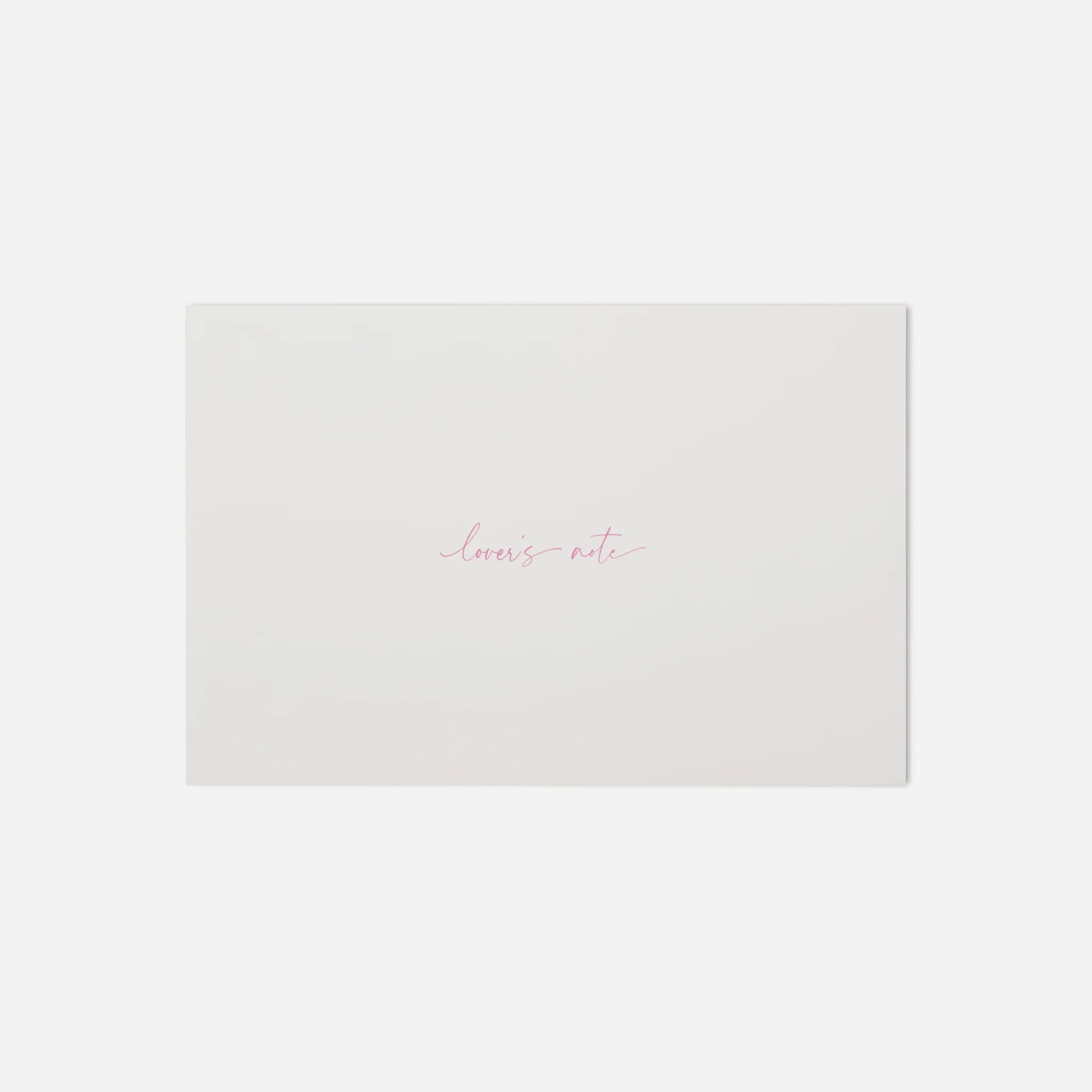 White paper with 'loves note' text on a white background