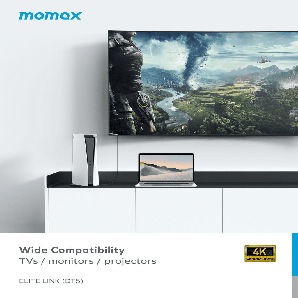 TV setup with laptop and speakers on a white wall, featuring Momax brand.