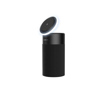 A black cylindrical 4-in-1 charging stand with a speaker on top and an LED light, designed for devices such as smartphones and earbuds.