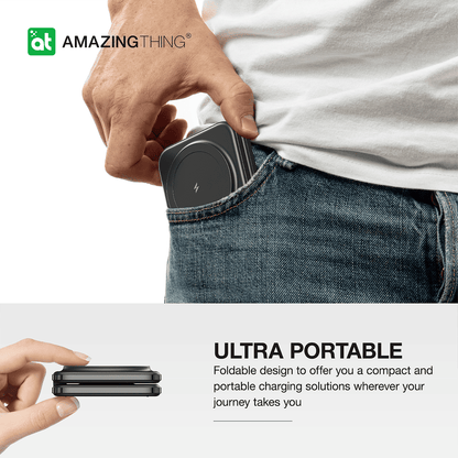 Person holding a compact charging device with 'Amazing Thing' branding, emphasizing portability.