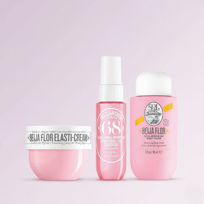 Three skincare products from Beija Flor on a light pink background