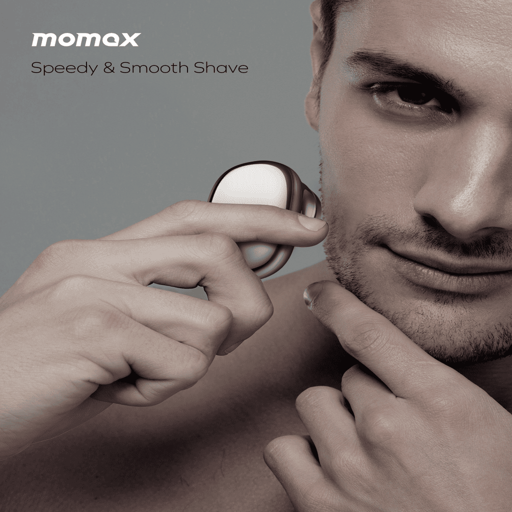 Man using a grooming tool with 'momax' branding on a gray background